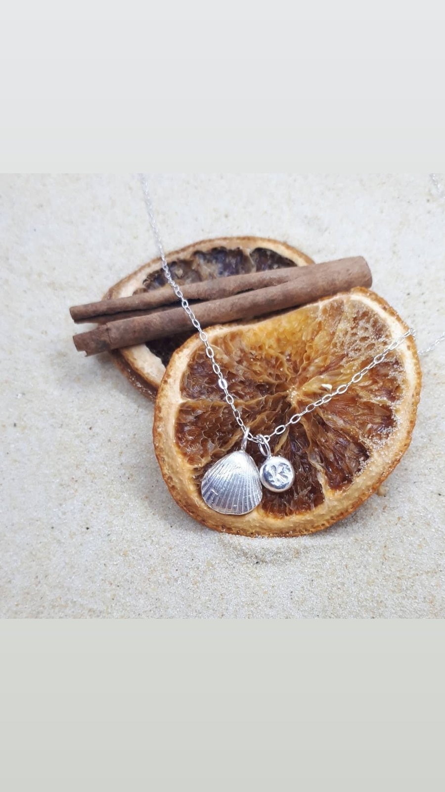 Personalised initial and cockle shell pendant