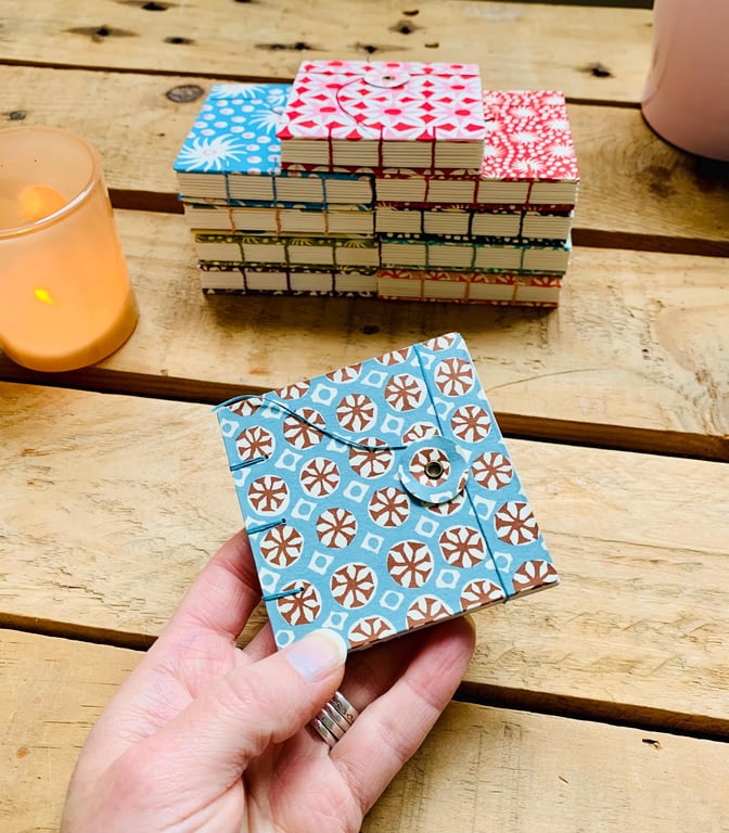 Mini Hand Bound Mixed Media Sketchbooks with Button Closures.