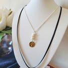 Fresh water pearl charm and ribbon sterling silver necklace