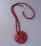 Red Glass Pendant on Red and Black Braided Rope - Image 1