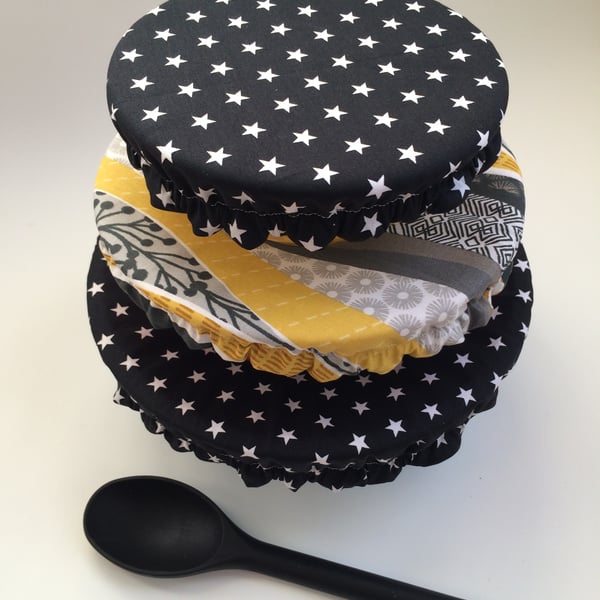 Set of 3 reusable bowl covers to keep food fresh and safe. Black and yellow.