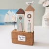 Tall Wooden Sea Huts with Clay Flower and Seagull 'By the Sea'