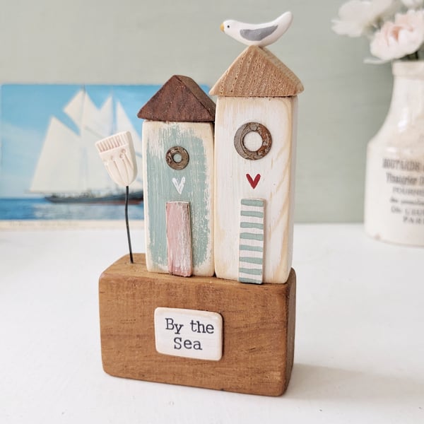 Tall Wooden Sea Huts with Clay Flower and Seagull 'By the Sea'