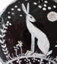 white hare on wood slice black background - Image 2