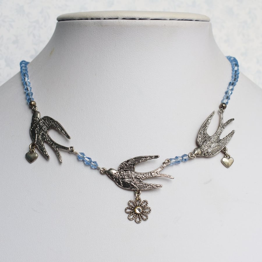 Swallows Necklace with Blue Glass Beads and Tiny Hearts
