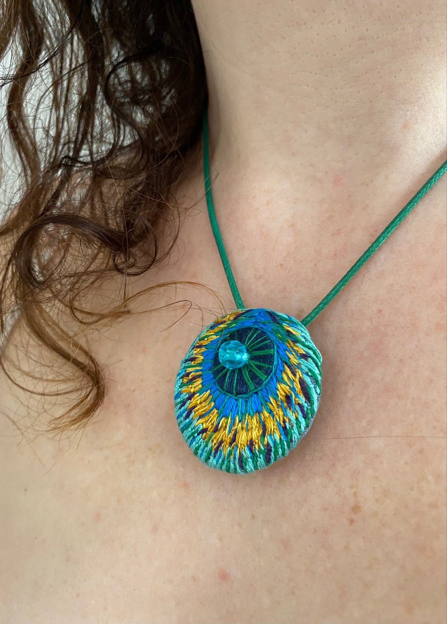 Hand embroidered pendant, inspired by peacock feathers 