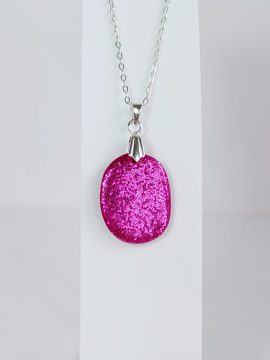 Cerise pink sparkle small oval pendant      