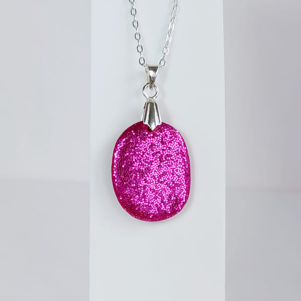 Cerise pink sparkle small oval pendant      