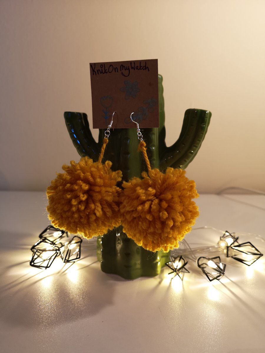 Large mustard pom pom earrings