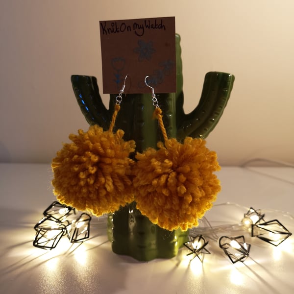 Large mustard pom pom earrings