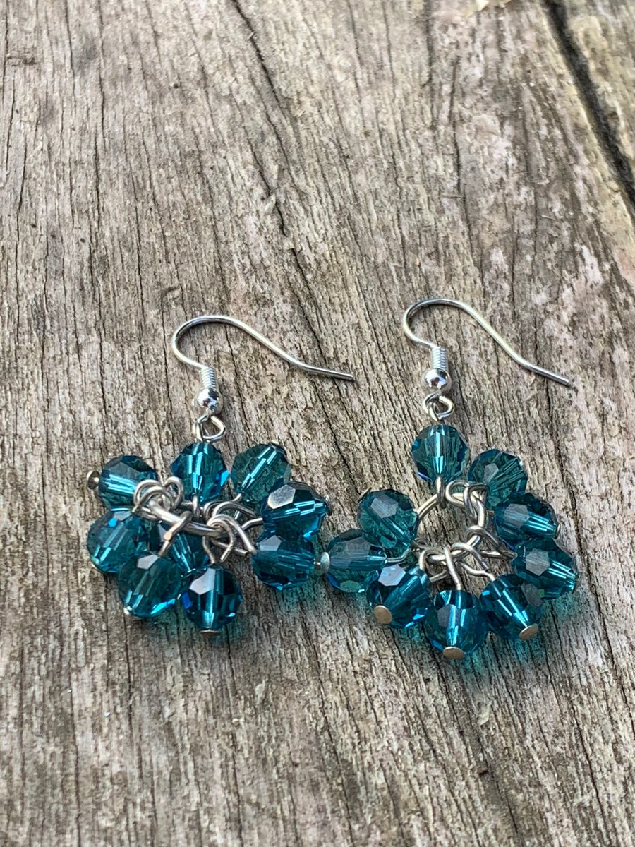 Blue clustered dangle earrings