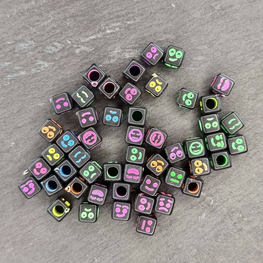 50 multi coloured smiling face black square beads 