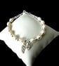 White Pearl & Sterling Silver Angel Wing Bracelet with CZ Heart – Adjustable Mem - Image 2