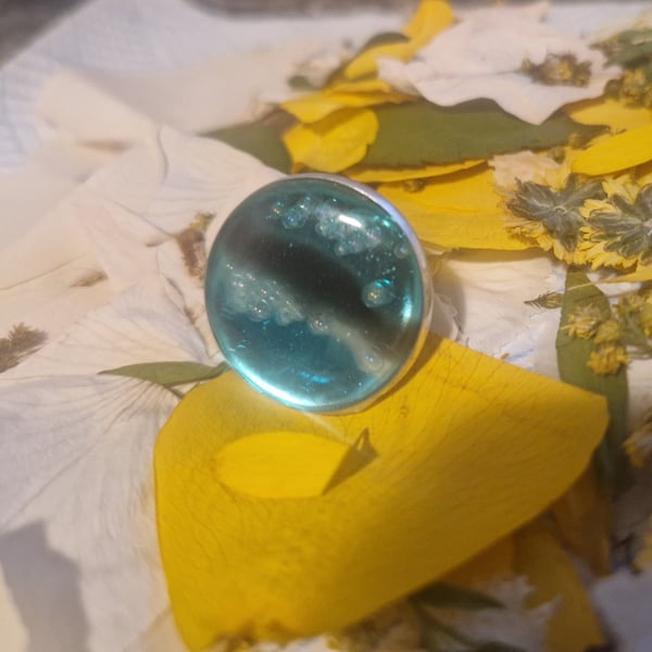 Adjustable blue resin ring... "on the horizon"