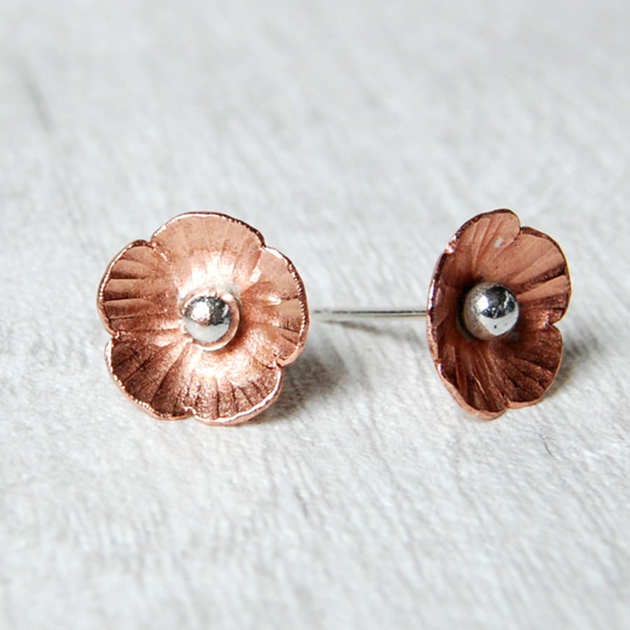 Copper flower studs shiny finish