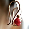 Small gold drop earrings with dark red burgundy bead