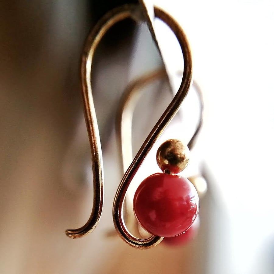Small gold drop earrings with dark red burgundy bead