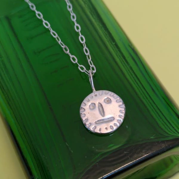 Silver folk necklace 
