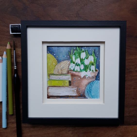 Snowdrops, books and yarn - small original artwork, framed 