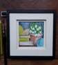Snowdrops, books and yarn - small original artwork, framed 