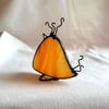 Rich orange stained glass bird with funky hair style, Bird with  Attitude