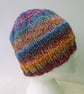 Multi coloured stripey chunky beanie hat for an adult - Image 4