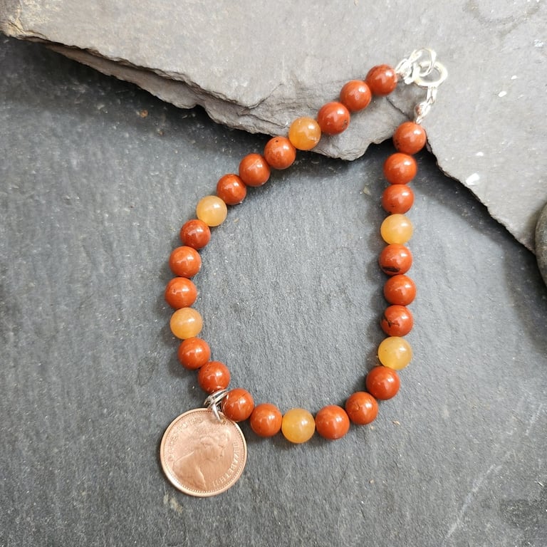 1975 halfpenny charm bracelet with red jasper and aventurine