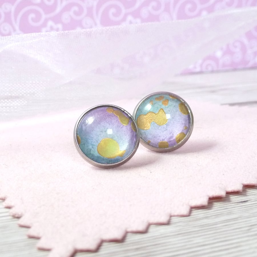 Lilac and green studs with gold foil highlights. Pastel limited collection studs