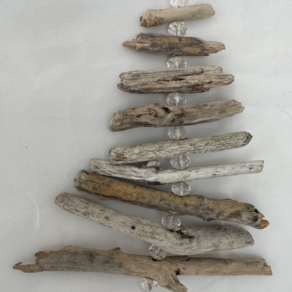 A Driftwood Christmas Tree Decoration with Clear Beads.
