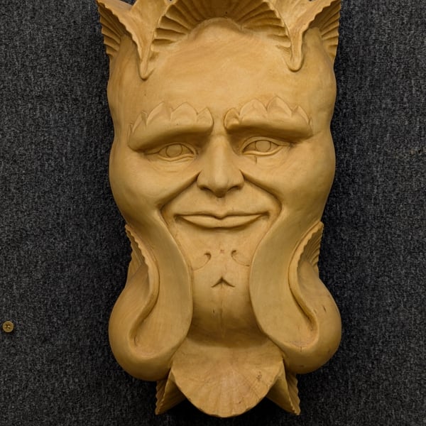 Hand carved wooden sculpture Aqua Man 