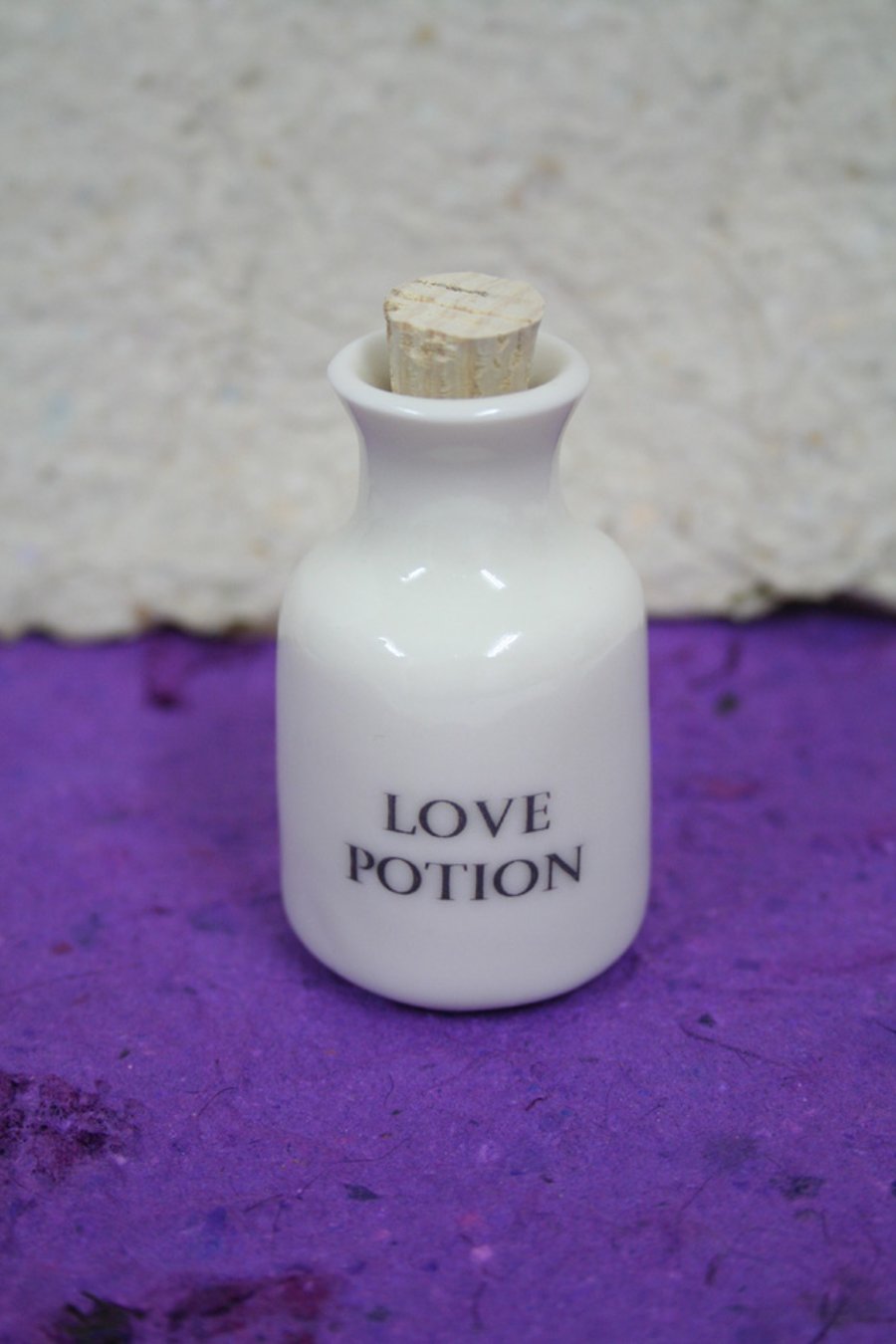 Small porcelain bottle with love potion wording