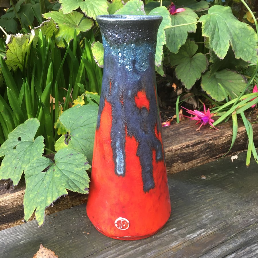 Retro design tubular shaped vase with a Black Lava and vibrant Red glaze 