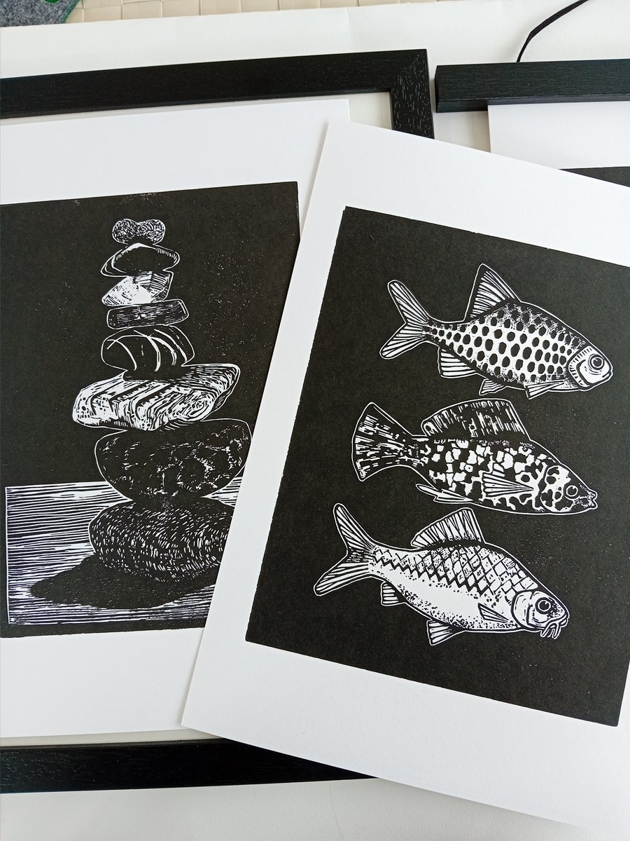 Pebbles and Fish linocut prints. Original handprinted black and white linoprints