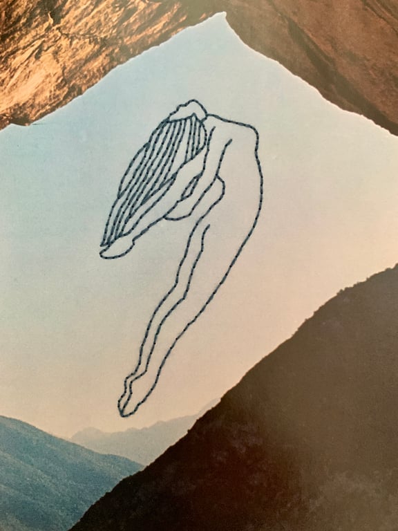 Hand embroidered vintage book page