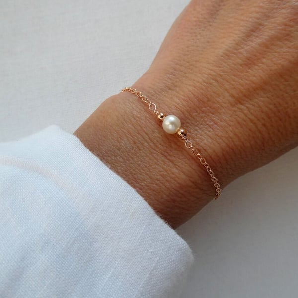 Rose gold chain and freshwater pearl bracelet