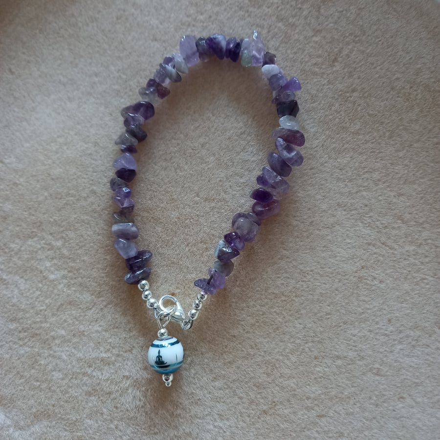 Amethyst bracelet with Buddha charm