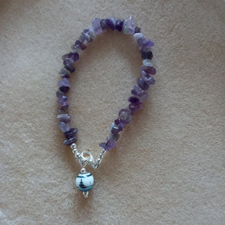 Amethyst bracelet with Buddha charm