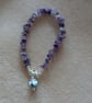 Amethyst bracelet with Buddha charm - Image 1