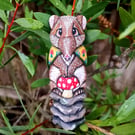 Portabello the Potaroo - painted wood carving