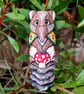 Portabello the Potaroo - painted wood carving