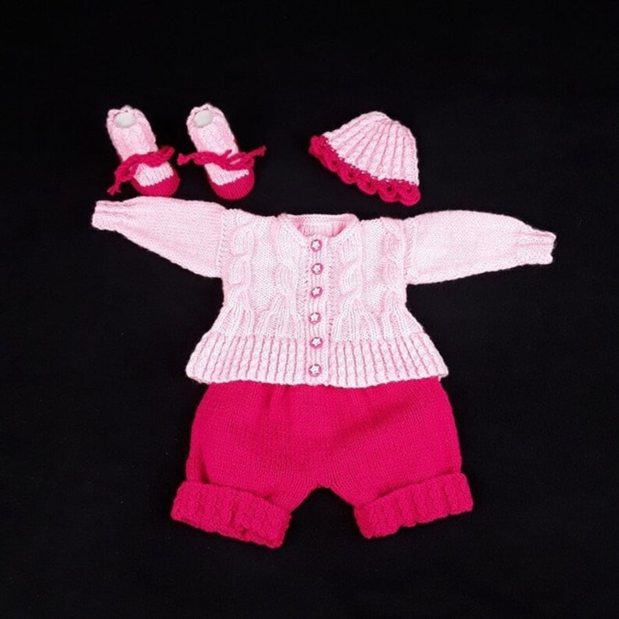 Pink hand knitted baby cardigan, shorts, hat and booties Seconds Sunday 