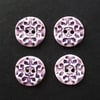 Set of four little handmade ceramic buttons