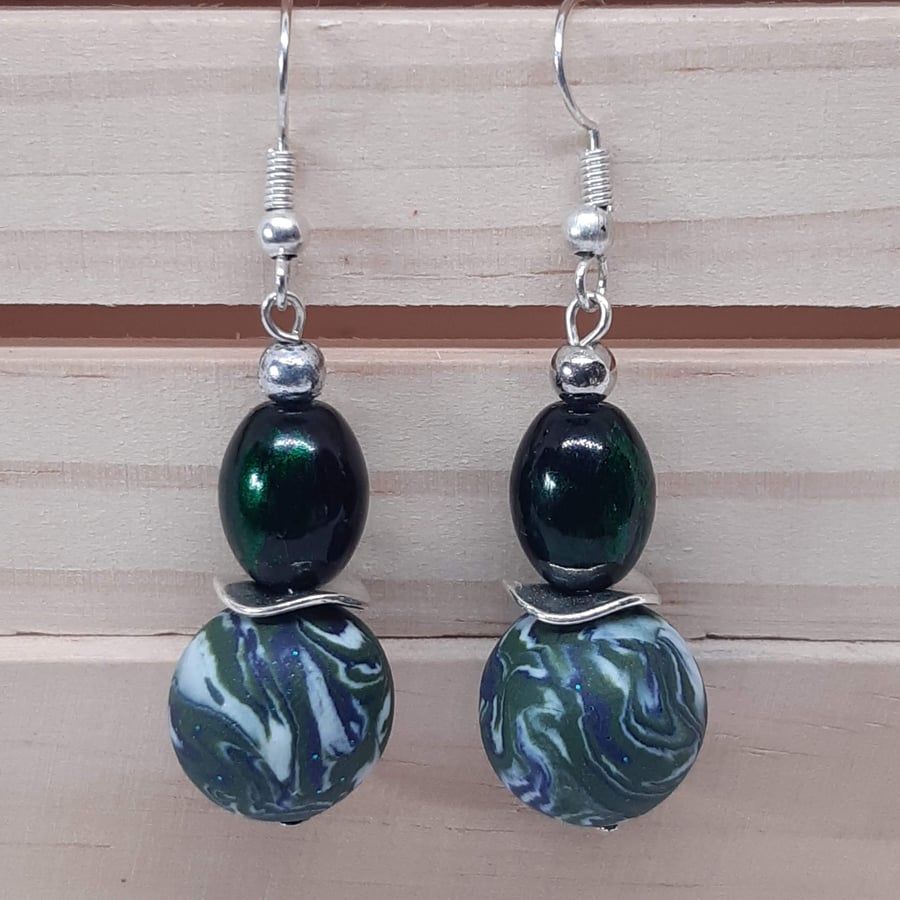 Earrings in forest green, black and silver swirl