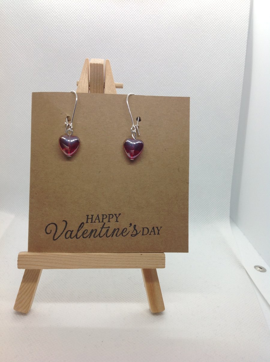 Valentine's Day earrings attached to greetings card.