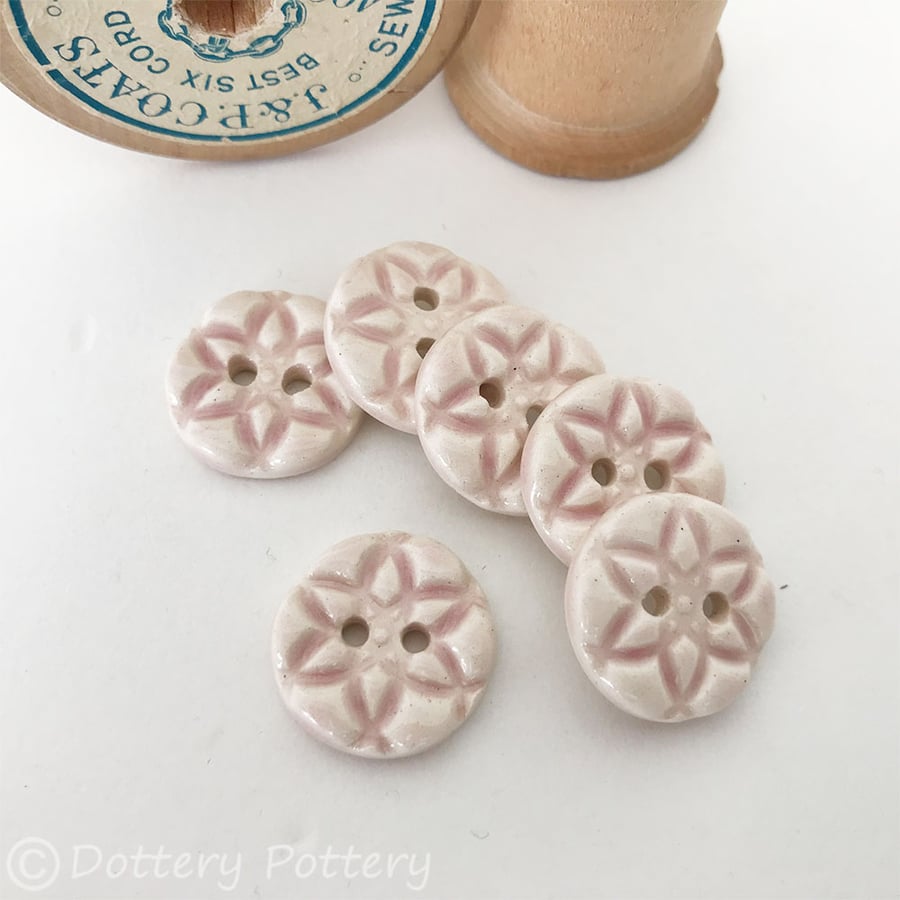 Set of six little pale pink coloured round ceramic handmade buttons