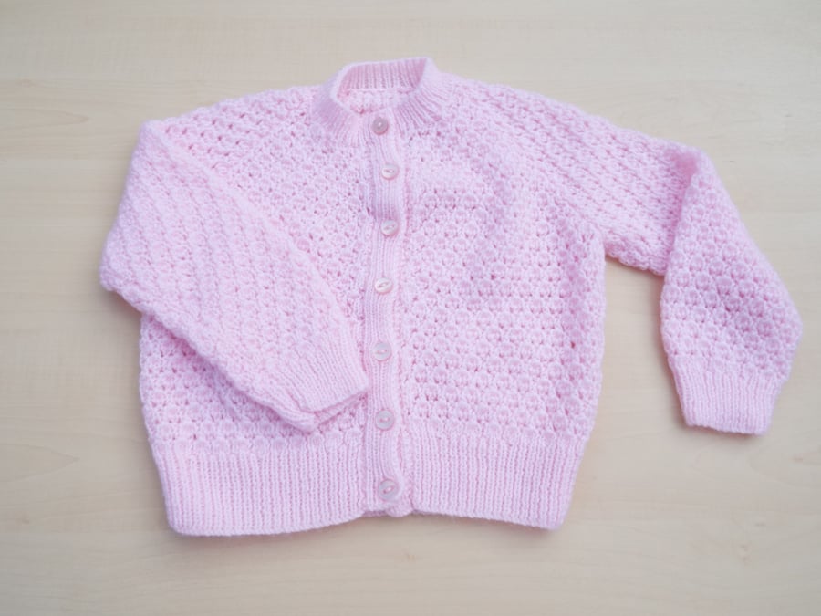 Baby cardigan hand knitted in pink 18 months