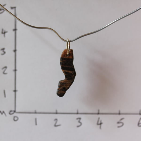 small wooden pendant