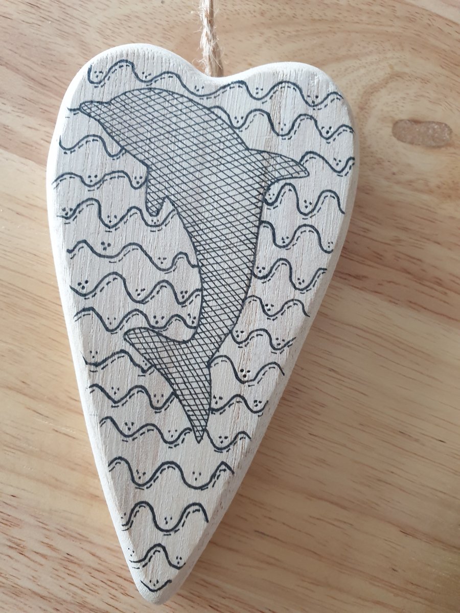 Dolphin hand drawn wooden heart