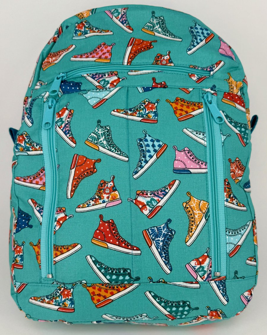 Turquoise Oilcloth Backpack with Running Shoe Design, Zipped Pockets, Lined Inte