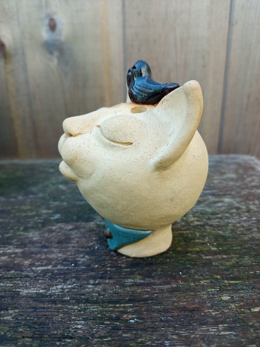 Albert, small ornamental cat with bird
